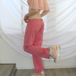 Low-rise, size 6, pink Gap jeans with yellow stitching and bootcut/flared legs